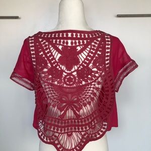 Cute pink top with detailing for sale!